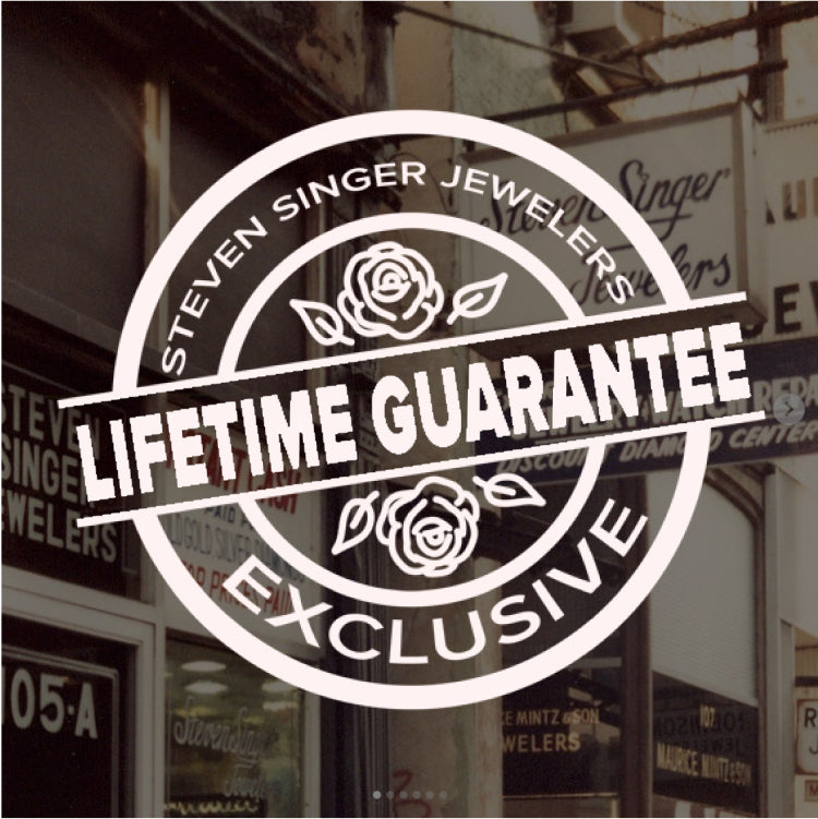 A back drop of the old store front with a lifetime guarantee logo in front.