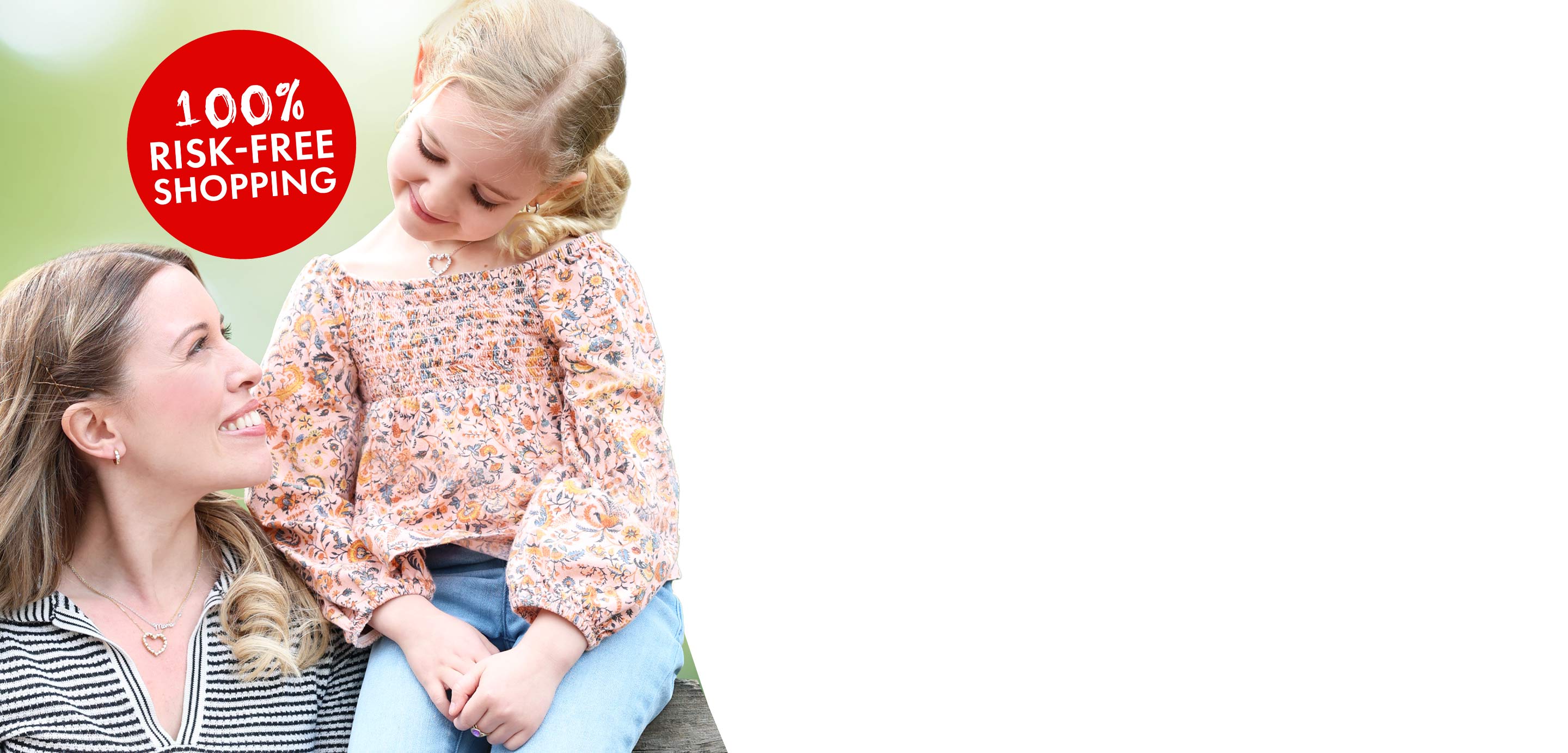 A woman smiling at her daughter wearing jewelry from our Mother's Day Collection.
