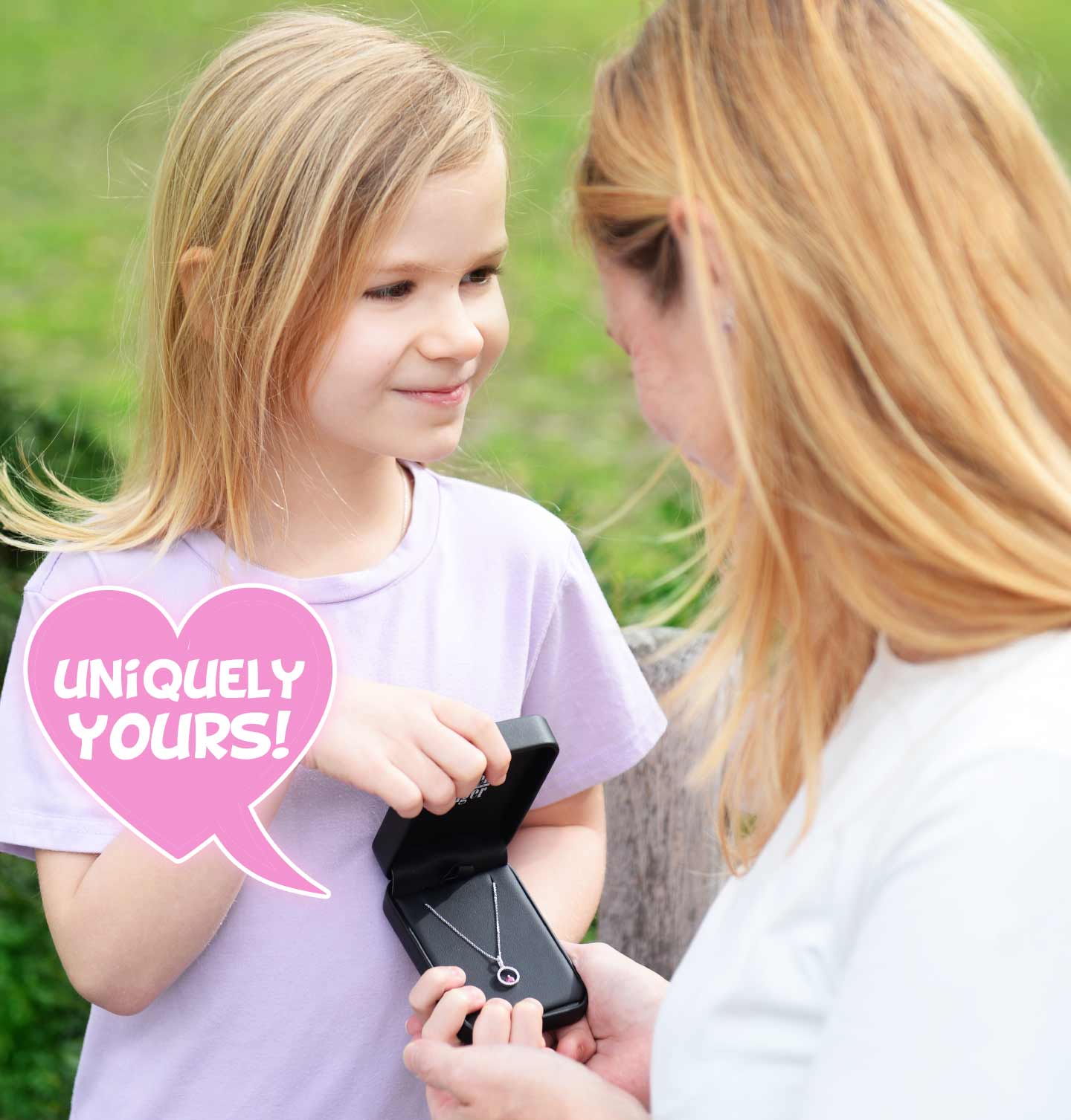 A daughter gifting her mom a personalized piece of jewelry from our Personalized Jewelry Collection.