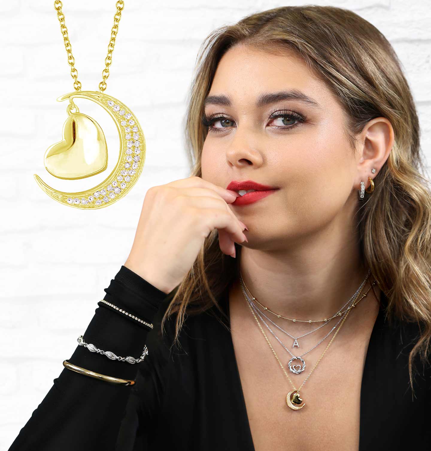 A woman modeling our top 12 jewelry gift picks.