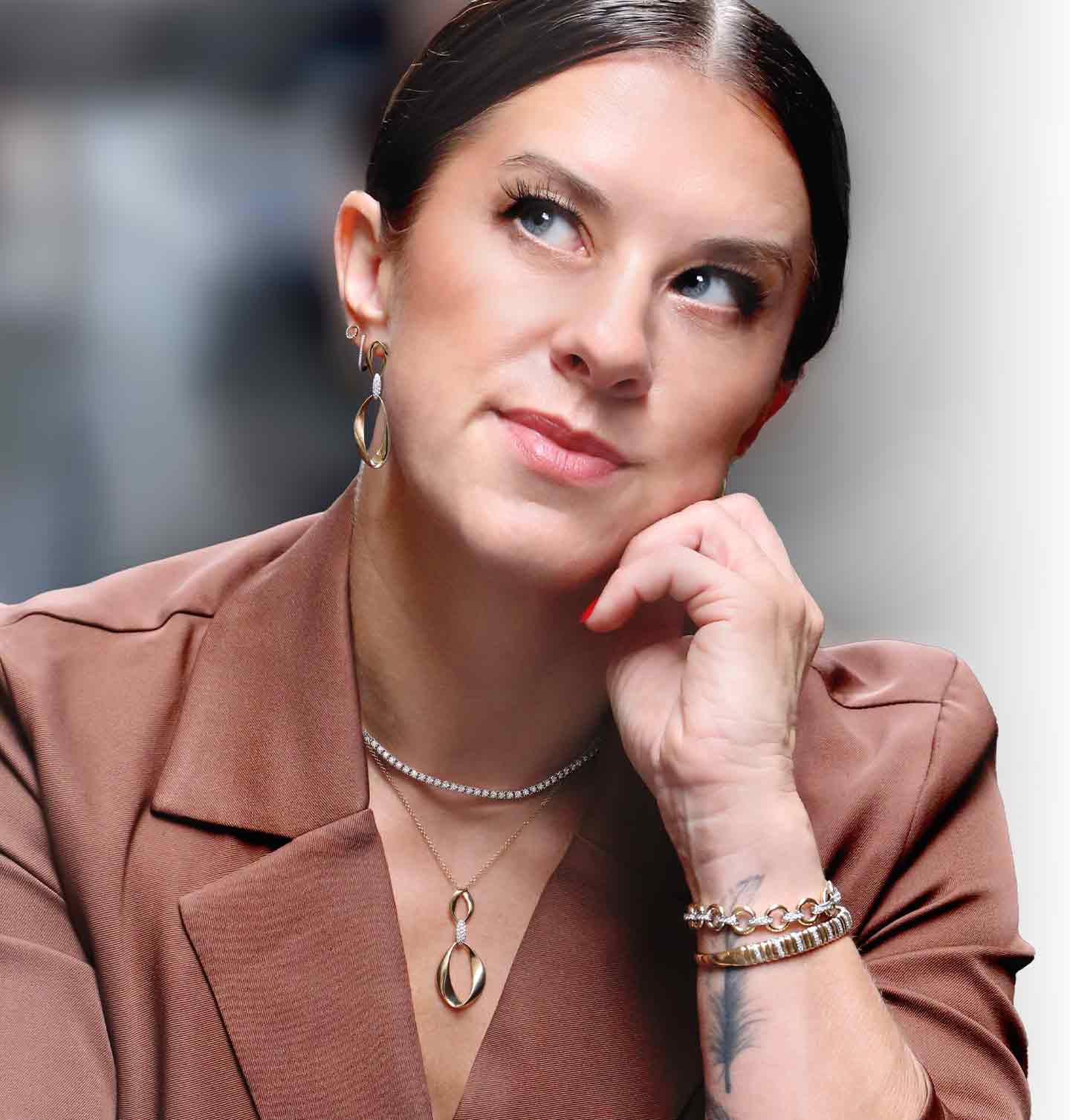 A woman modeling our Natural Unity Diamond Jewelry Set.