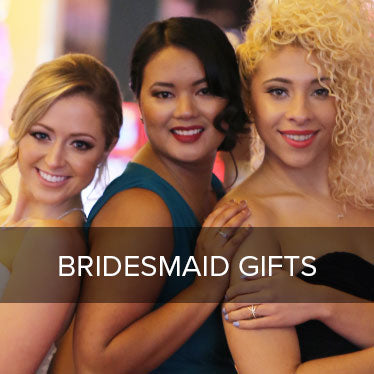 A group of bridesmaids wearing jewelry from Steven Singer Jewelers.