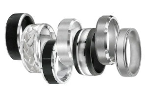 7 men's wedding rings, 4 being white gold, 2 being tungsten, and the last one features a mix of white gold and tungsten.